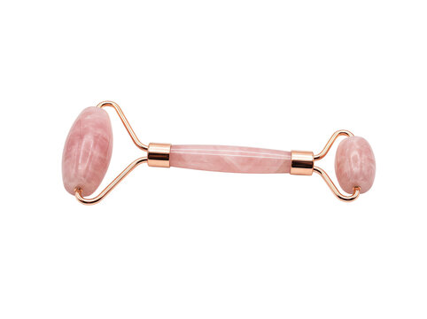 Rose quartz facial roller isolated on transparent background