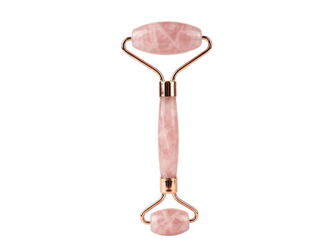 Rose quartz facial roller isolated on transparent background