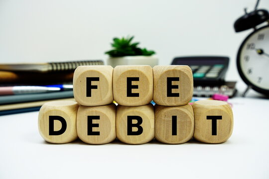 Fee Debit alphabet letters with calculator and alarm clock on white background