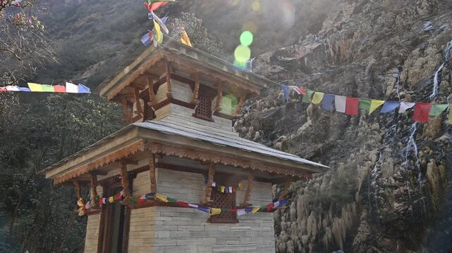 A religious shrine on the way to Annapurna base camp in Nepal. A holy or sacred place dedicated to a deity, saint, ancestor, or a specific religious event.