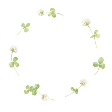 A very thin airy ring wreath of white clover leaves and small round clover blossoms, only