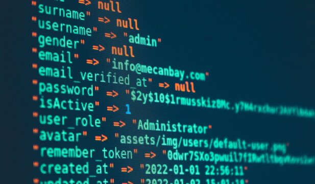 Computer programming source code displayed on a dark screen with syntax