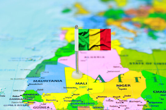 Flag of Mali Pinned on World Map Concept for Travel Destination, West Africa, and International Relations