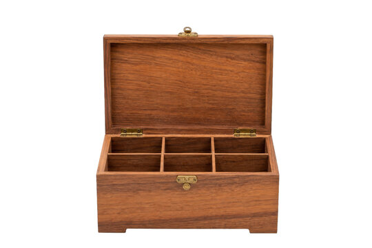 Empty open wooden tea box with six compartments and brass hardware is isolated on a clean white background