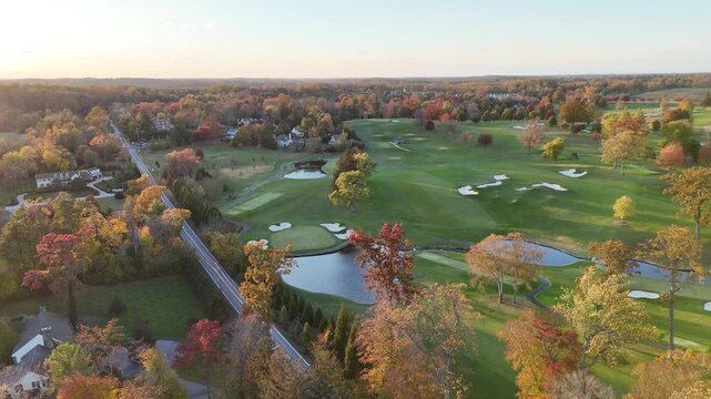 Aerial View of a Residential Neighborhood Near a Golf Course in Greenville, Delaware in Autumn 
