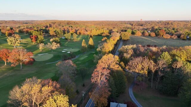 Aerial View of a Residential Neighborhood Near a Golf Course in Greenville, Delaware in Autumn 