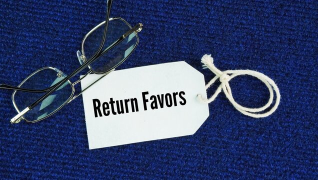 Glasses and paper tags with the words Return favors. To do something helpful or kind for someone who previously did a good deed for you.