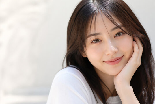 頬杖をついて微笑む若い日本人女性 Generative AI