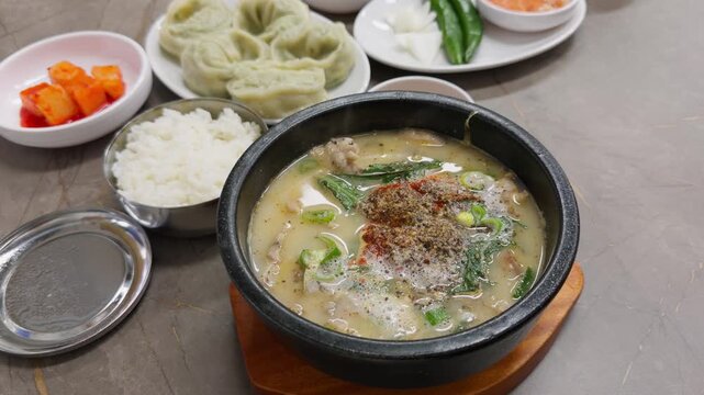 Korean Pork Soup Rice Gukbap with Handmade Dumplings Set Meal Slow Pan