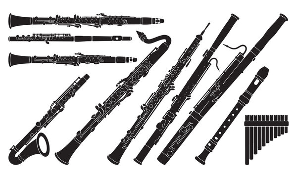 Set of black silhouettes representing various woodwind musical instruments including clarinets, flutes, oboes, bassoons, and a pan flute isolated on a white background, for music