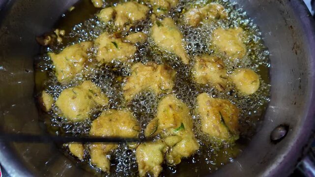 Traditional  Vada Deep Frying Process ,slow motion