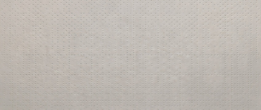 ドット型押しの淡いグレージュレザー質感背景 / Dot Embossed Pale Greige Leather Background
