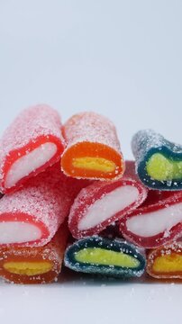 Colorful fruit candy on white background