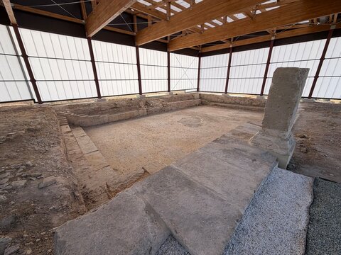 Ancient roman archaeological site under modern protective structure