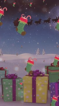 Animation of snow falling over christmas pattern and decorations