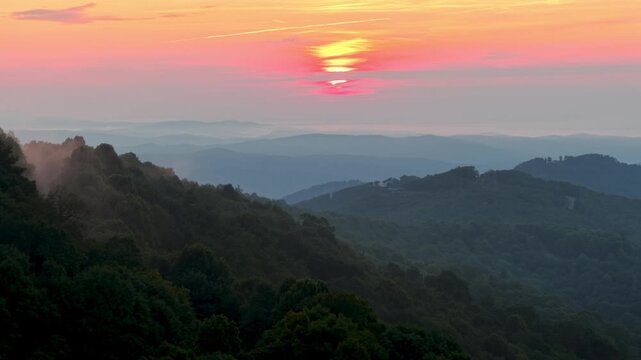 aerial sunrise and fot over the blue ridge mountains