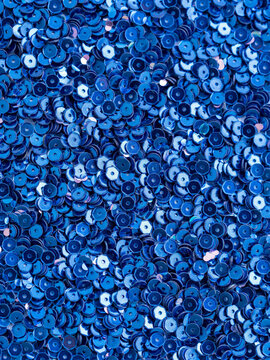 Abstract background of shiny blue sequins