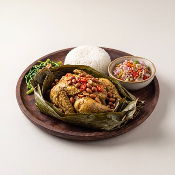 Balinese Ayam Betutu with Peanuts and Chili on Wooden Plate with Rice AI Generated
