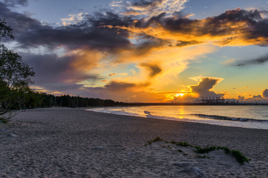Sunset over the Baltic Sea beach in Gorki Zachodnie, Gdansk. Poland