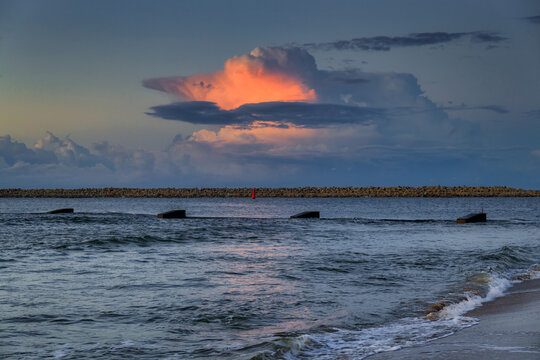 Sunset over the Baltic Sea beach in Gorki Zachodnie, Gdansk. Poland