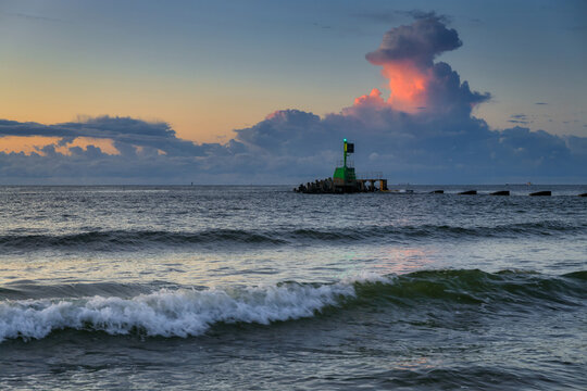 Sunset over the Baltic Sea beach in Gorki Zachodnie, Gdansk. Poland