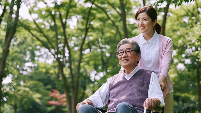 Elderly man and adult woman enjoying outdoor companionship in green park, smiling warmly during peaceful afternoon together