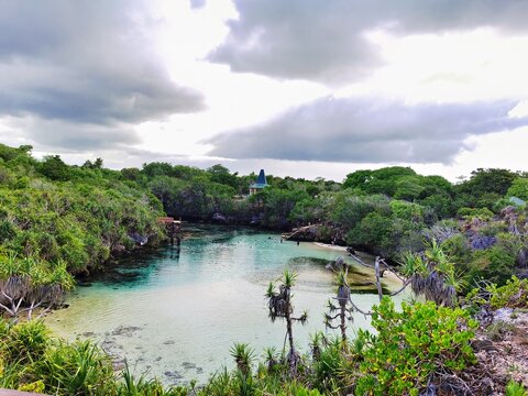 Rugged Limestone Cliffs Enclosing the Scenic Waikuri Lagoon in Sumba
