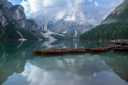 Lago di Braies with Wooden Boats and Dolomite Mountains, South Tyrol, Italy