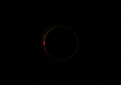Magnificent Crimson Chromosphere Flash During Complete Solar Eclipse