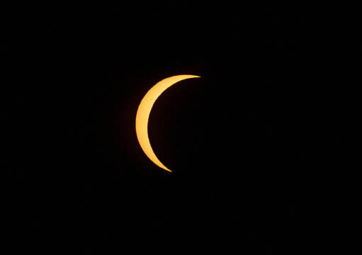 Crescent sun during a partial solar eclipse