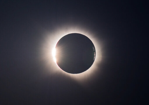 Solar Eclipse Telescope View with Glowing Radiant Sun Corona