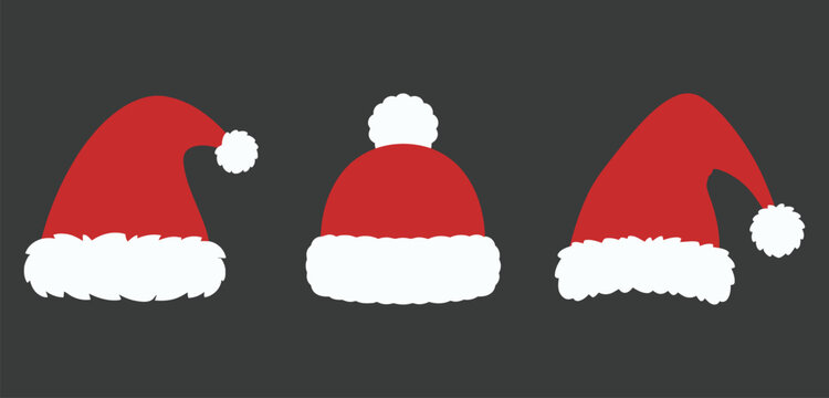 Set of three different red santa claus hats with white fur trim a dark background