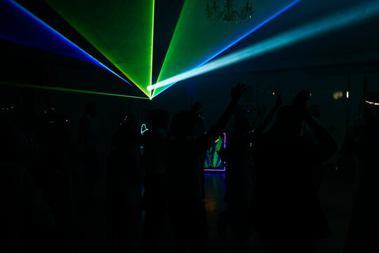 Unrecognizable people dancing in a nightclub