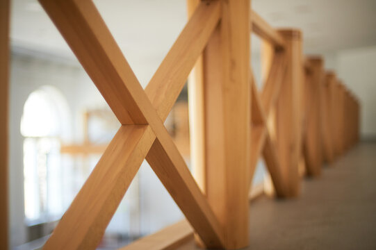 Wooden Cross Railing Balustrade Close Up in Modern Interior Architecture