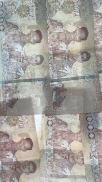 Thai baht currency banknotes background pattern, Asian money cash vertical video thumbnail