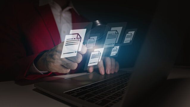 Business professional managing digital documents and electronic files through a secure online workflow, representing paperless office, cloud storage and modern business data management.