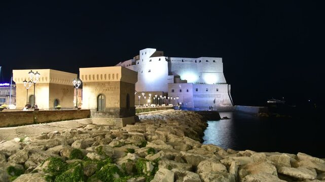 Timelapse of castel dell'ovo in naples illuminated at night