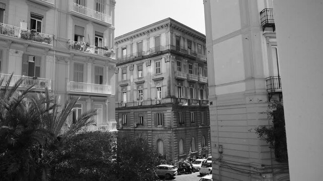 Black and white timelapse of historic european urban buildings