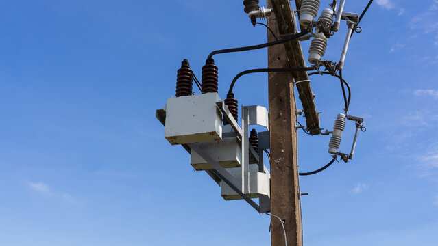 Capacitor bank and high voltage cutout fuses on utility pole