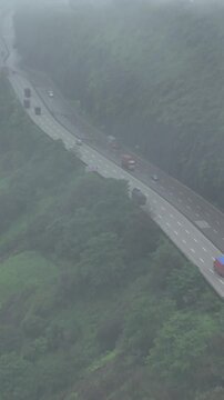 Vertical Aerial View of Lonavala Hill Road in Monsoon Pune