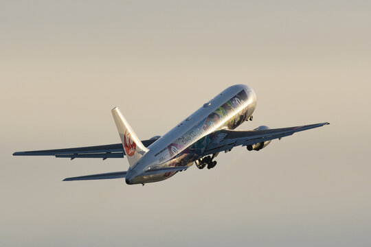 Japan Airlines Boeing 767-300ER (JA615J) passenger plane in Disney100 Dream Express livery taking off from Haneda Airport