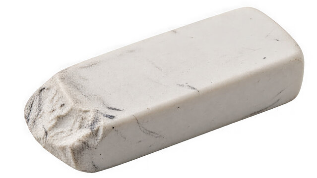 Well-used white eraser with textured edges on a clean white background