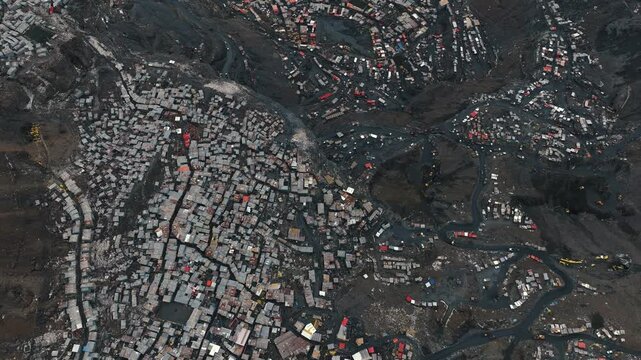 Dense Corrugated Metal Housing in Mining Town From Above