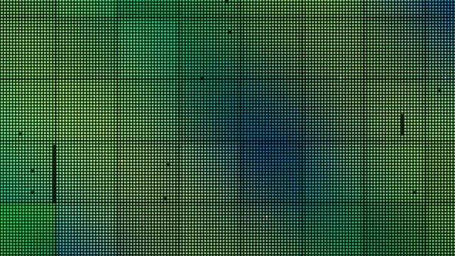Broken LED Video Wall Close Up: Dead Pixel Columns and Panel Dropout Glitch, Seamless Loop in cool emerald tones