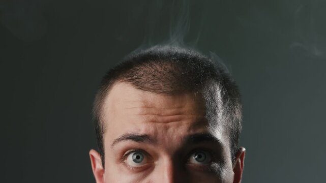 Young Man With Alarmed Expression And Psychological Distress