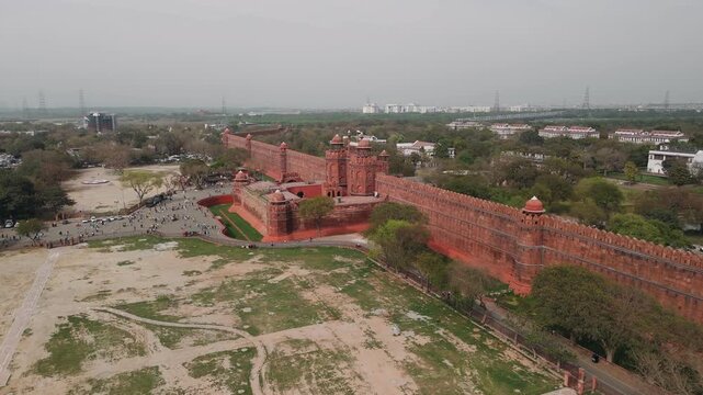 Aerial view of the historic red fort in delhi with the cityscape in the background, a famous landmark of india