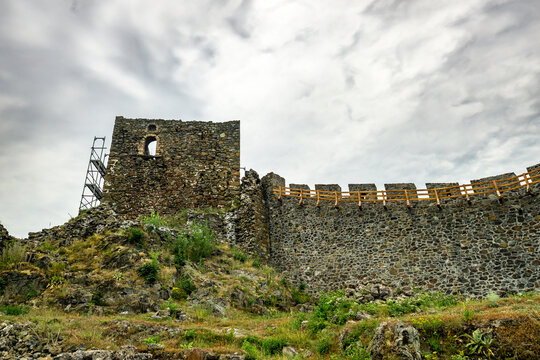 Ruins of medieval fortress Maglic on top of hill by the Ibar river in Serbia. On the wall of medieval fortress Maglic