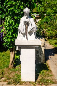 Vrbas, Serbia - May 24, 2026: A stone sculpture of Father Justin Popovic, a Serbian Orthodox theologian.