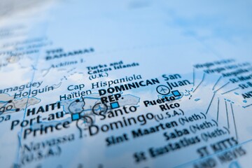 Naklejka premium Map of Dominican Republic styled in grey color. Selective focus on label, close-up view