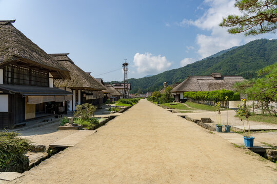 Historic streetscape of Ouchi-juku lined with traditional thatched-roof houses in Fukushima